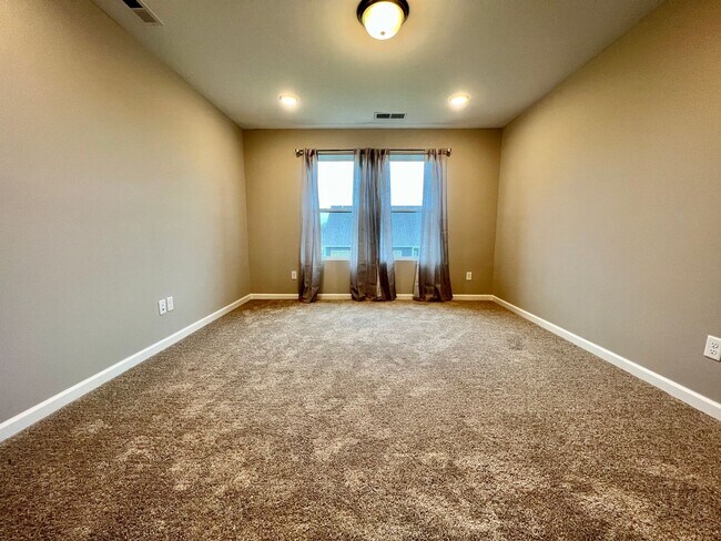 Building Photo - Like New 4 Bedroom Home w/ 2 Car Garage