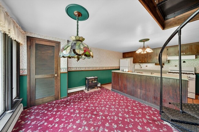 Building Photo - Price Reduction: Charming 3BR Farmhouse Re...