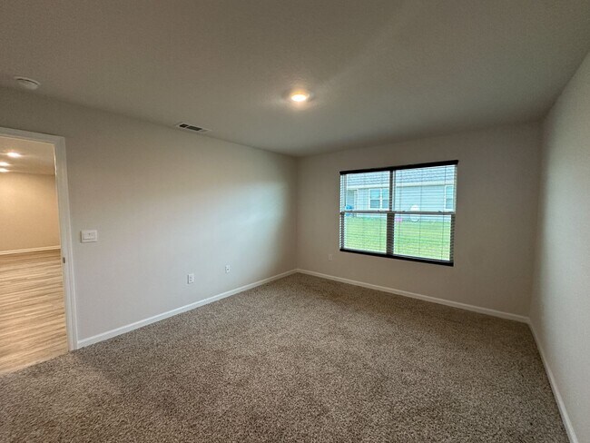 Building Photo - 4 bedroom 2 bath home in the Woodlands Subdivision in Milton, FL!