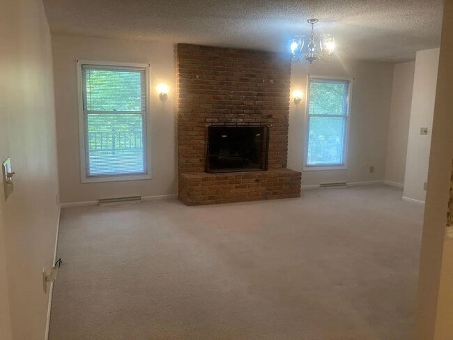 Building Photo - Beautiful Duplex Located in Serene, Wooded...