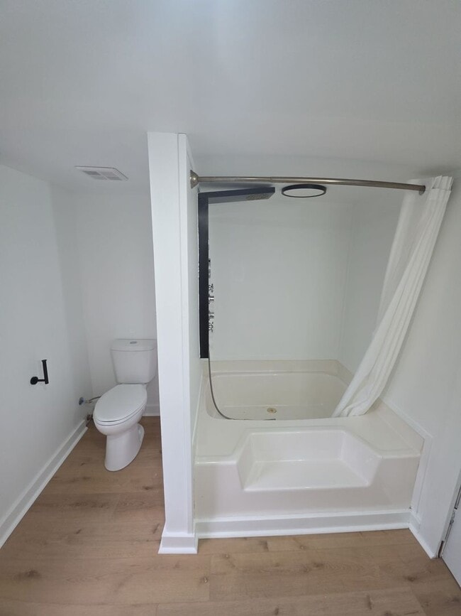 Building Photo - Remodeled 5-Bedroom Farmhouse with Modern Updates and Peaceful Country Setting in Sparta