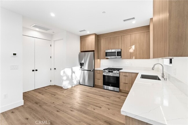 Building Photo - 7663 Maestro Ave