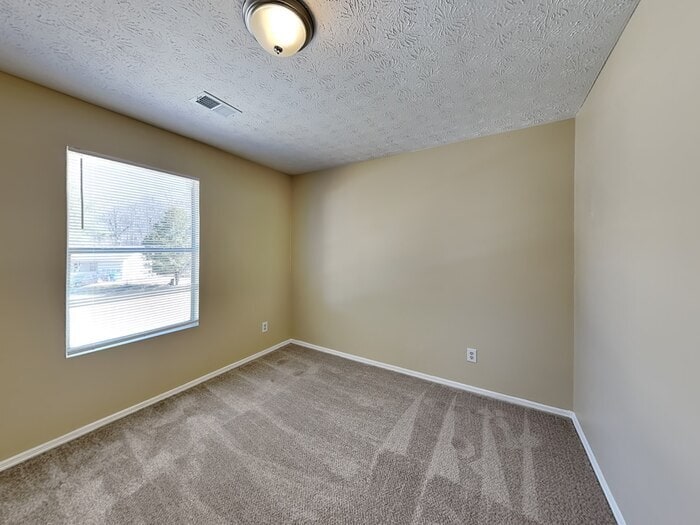 Building Photo - 6365 Peppermill Ln