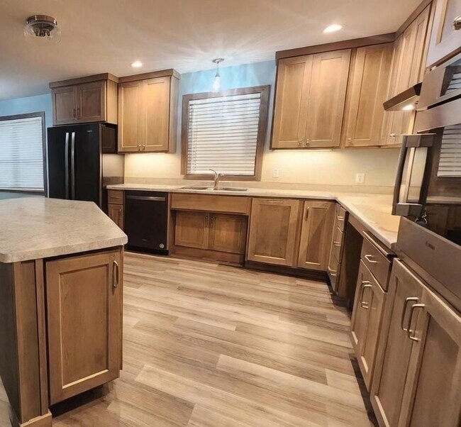 Building Photo - Modern 2022 Built 2 Bedroom, 2 Bathroom Accessible Twinhome with 2 Car Attached Garage!