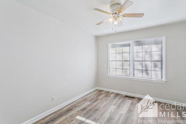 Building Photo - Updated, clean unit, with LARGE basement for storage!