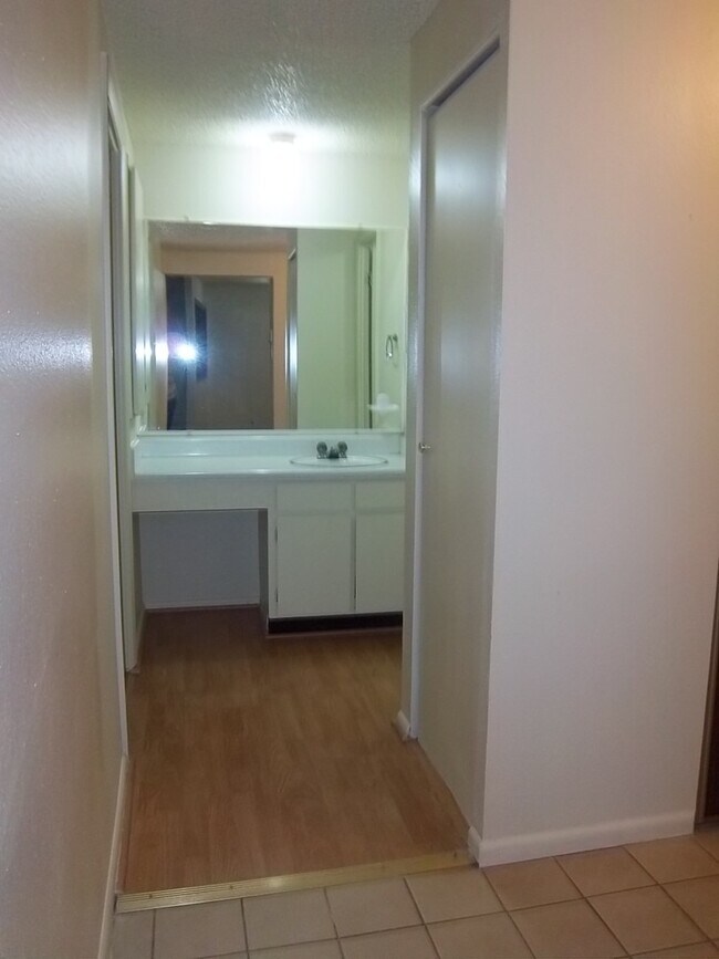 Building Photo - Wonderful 1 BR/1 BA third level condo in secured building.