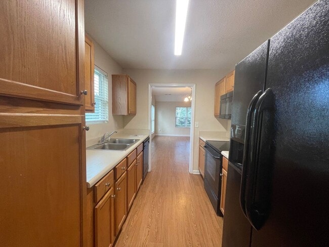 Building Photo - PRE-LEASING FOR AUGUST 2025!  1/2 OFF SECU...