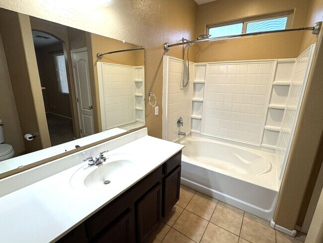 Building Photo - Beautiful 4-bedroom, 2-bath single-story home with Fully Landscaped Backyard