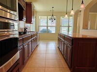 Building Photo - 5551 Twin Rivers Ln