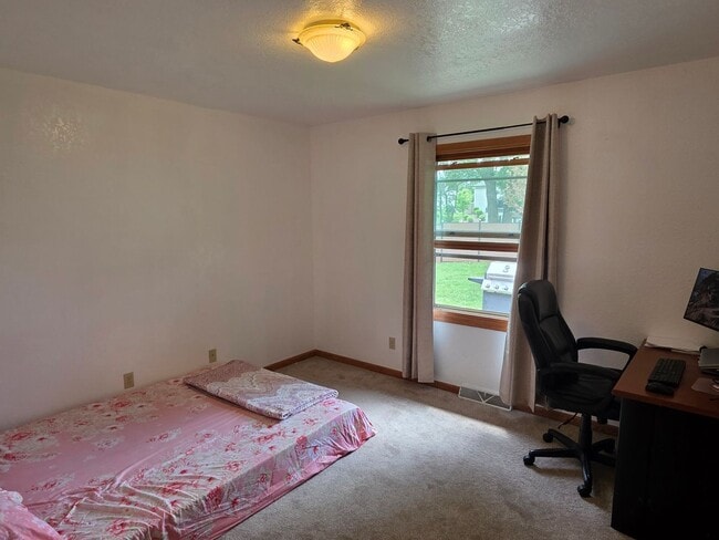 Building Photo - Updated 4 bedroom Greenfield ranch home
