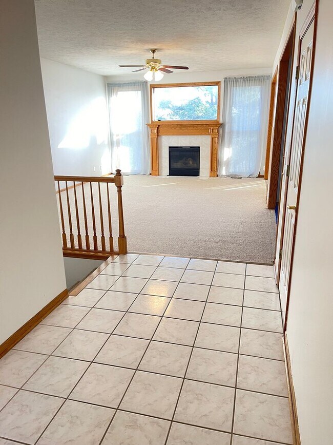 Building Photo - Northwest Omaha Gem: 2,700 Sq Ft, 3-Bedroom, Walk-Out Finished Basement, Fenced Yard, 3-Car Garag...