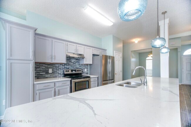 Building Photo - 4944 Greenland Hideaway Dr N