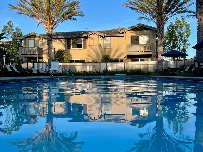 Building Photo - Stunning 3-Bed/2.5-Bath End Unit Condo with Solar & Large Yard