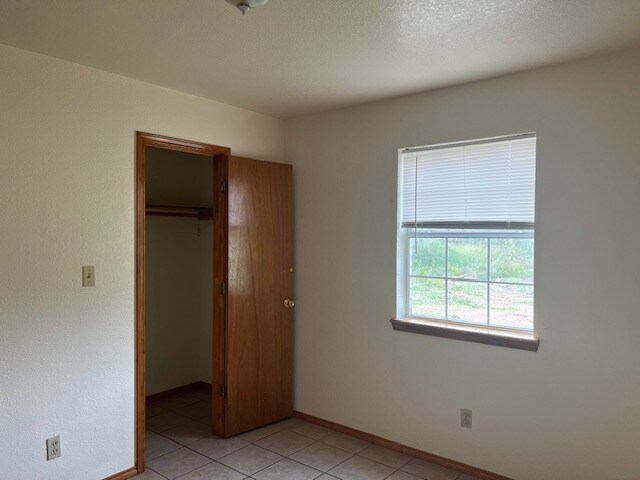 Building Photo - 1000 Wild Rose Ln