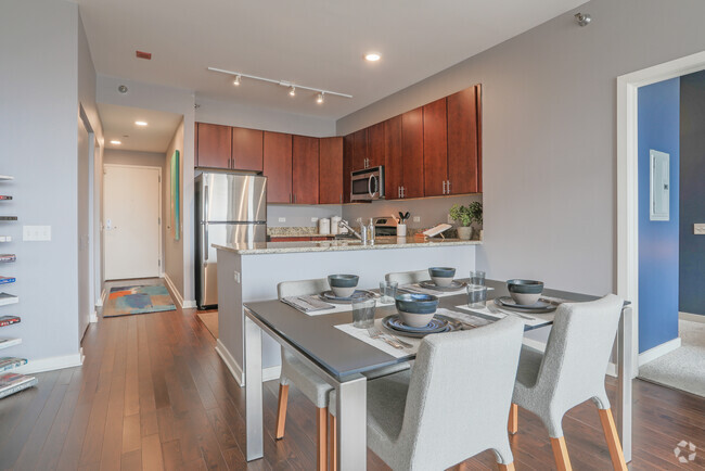 1 BR, 1.5 BA - Dining Area/Kitchen - Burnham Pointe