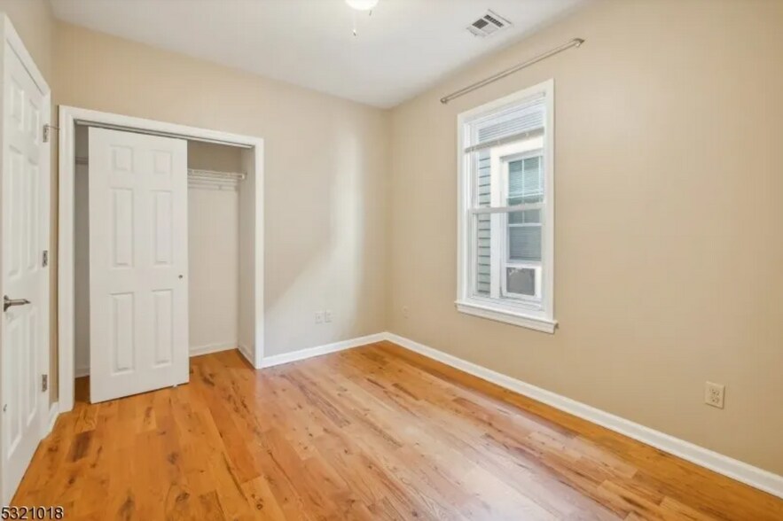 Bedroom Two with Closet & Window - 53 Portland Pl