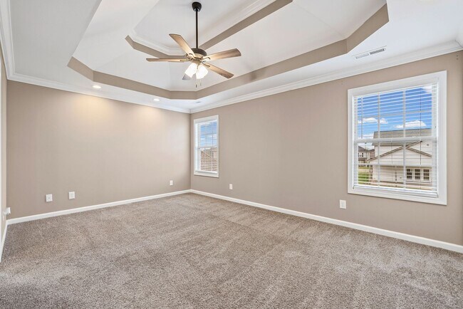 Building Photo - Four Bedroom with Three Car Garage!