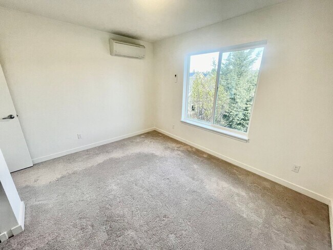 Building Photo - Sleek Townhome with Garage and Private Pat...