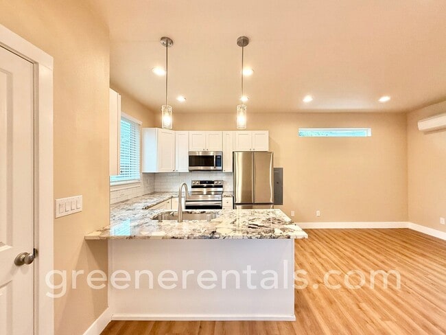 Building Photo - Modern 1-Bedroom Home with Yard, Deck & Ca...