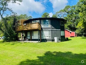 Building Photo - Fabulous unique living space over looking ...