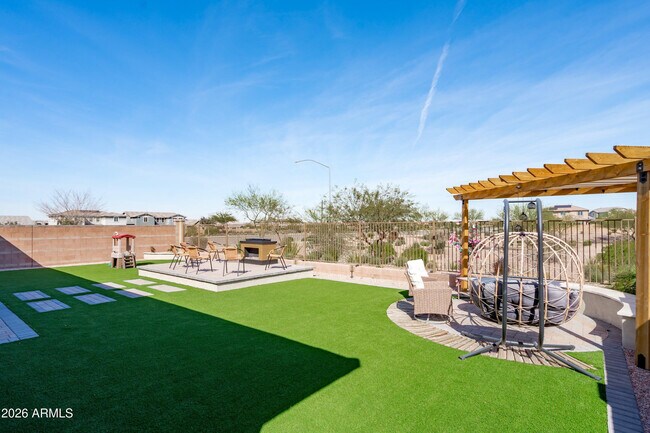 Building Photo - 10812 E Tesla Ave