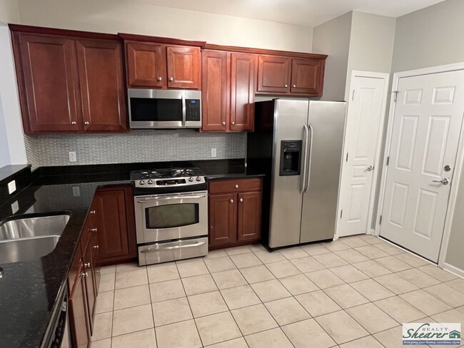 Building Photo - Beautiful 2 Story, 3 Bedroom Townhome near...