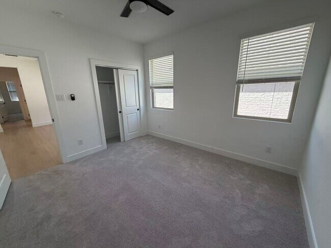 Building Photo - Move-in ready and like-new! Washer, dryer, and refrigerator Included.