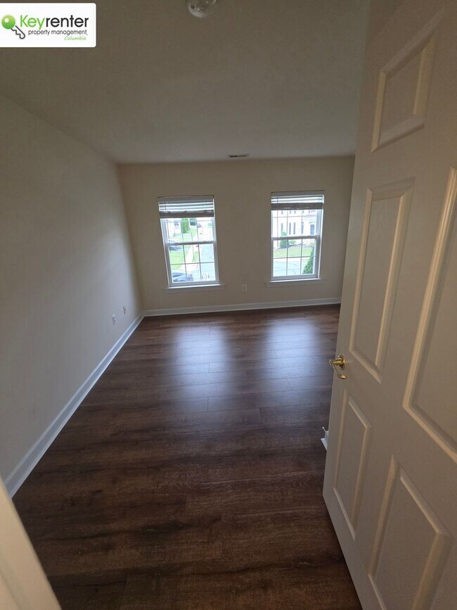 Building Photo - Beautiful 4-Bedroom Home in New Market – Hardwood Floors, Modern Kitchen, 2-Car Garage & Yard Car...