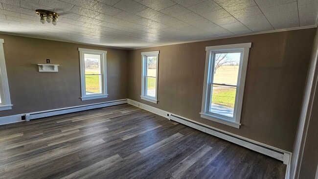 Building Photo - Country Living in This 4 Bedroom Farmhouse!