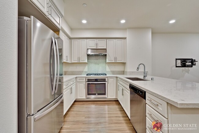 Building Photo - Modern 2-Bed Condo with Tesla Charger & At...