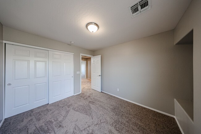 Building Photo - Welcome to this spacious 4 bedroom, 2.5 ba...