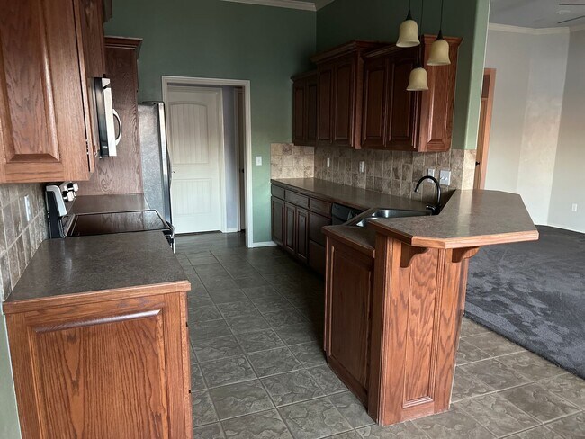Building Photo - functionality, style, and comfort—3 Bedroom 2 Bath with 3 car garage