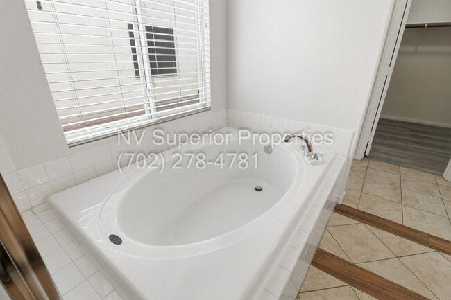 Building Photo - NW!! Single Story!!! 3 Car Garage!!  2 Masters!!! Low Maintenance desert landscape front yard!!  ...