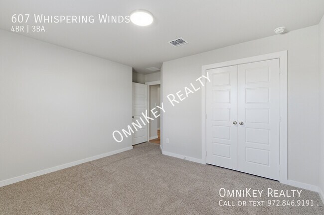 Building Photo - 607 Whispering Winds Trl