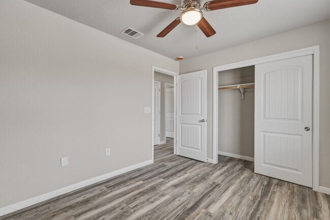 Building Photo - Gated Community Home with Solar Panels & All Appliances Included