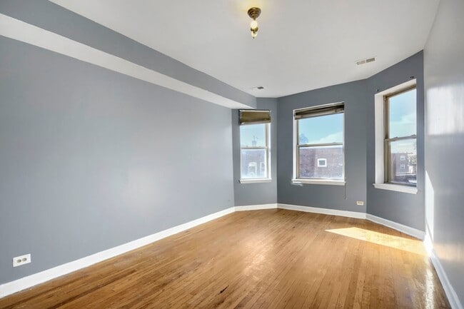 Building Photo - 7724 S Cornell Ave