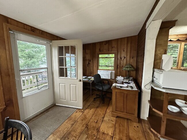 Building Photo - Peaceful Waterfront Living: 2-Story Home on River Road with Ample Outdoor Storage & Water Extras!