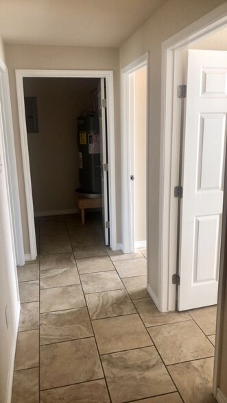Down hallway past storage closet - 1305 Kings Way