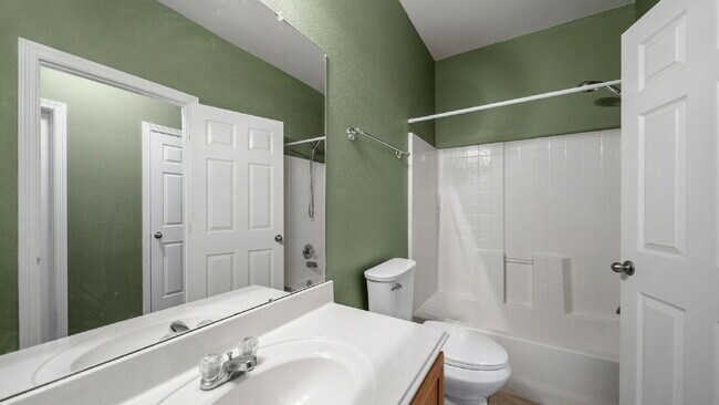 Building Photo - Move-In Ready Montgomery Home with Fenced Yard & Mature Trees!