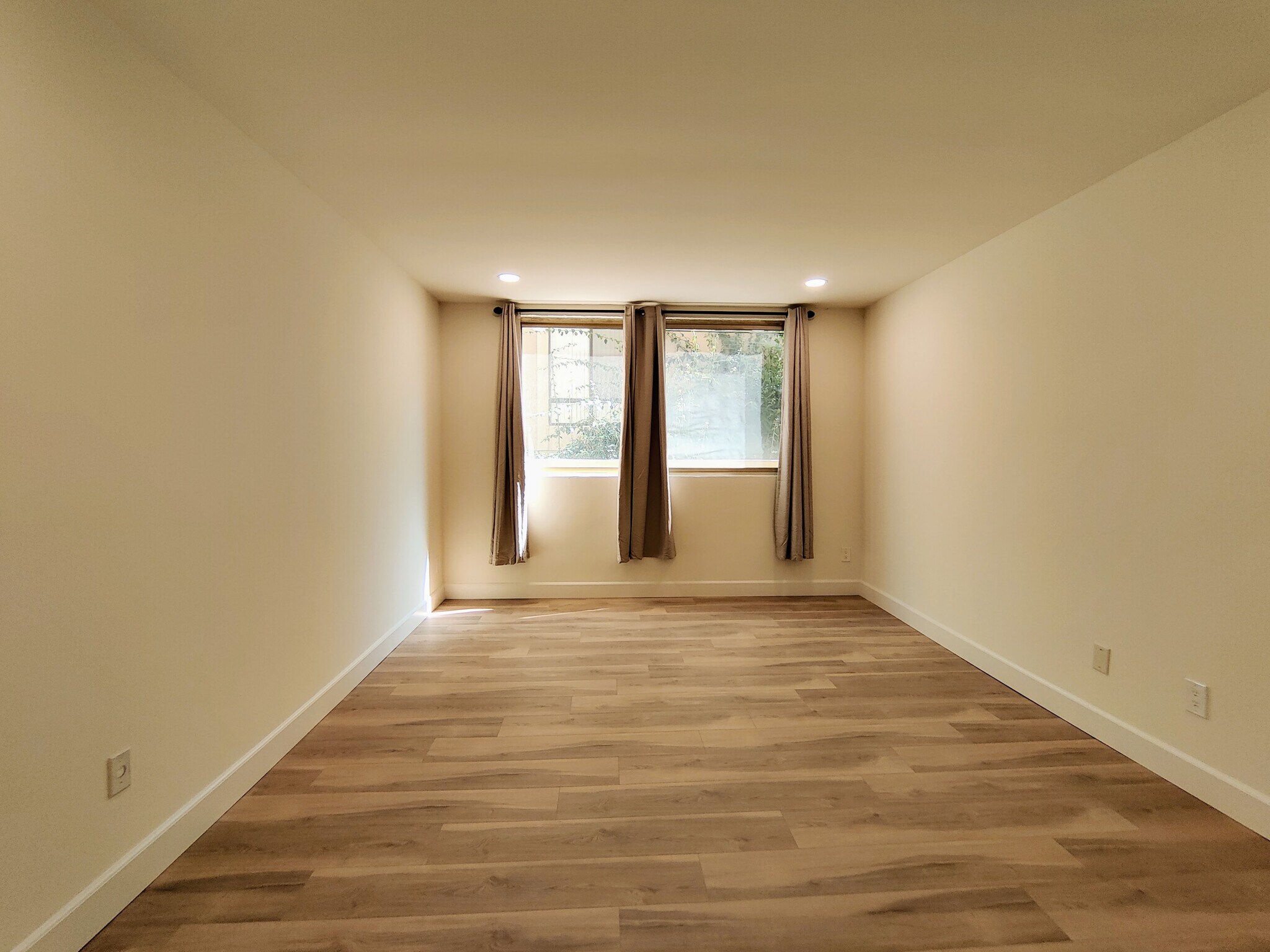 Another view of Primary Bedroom w/Large Window - 1300 Midvale Ave