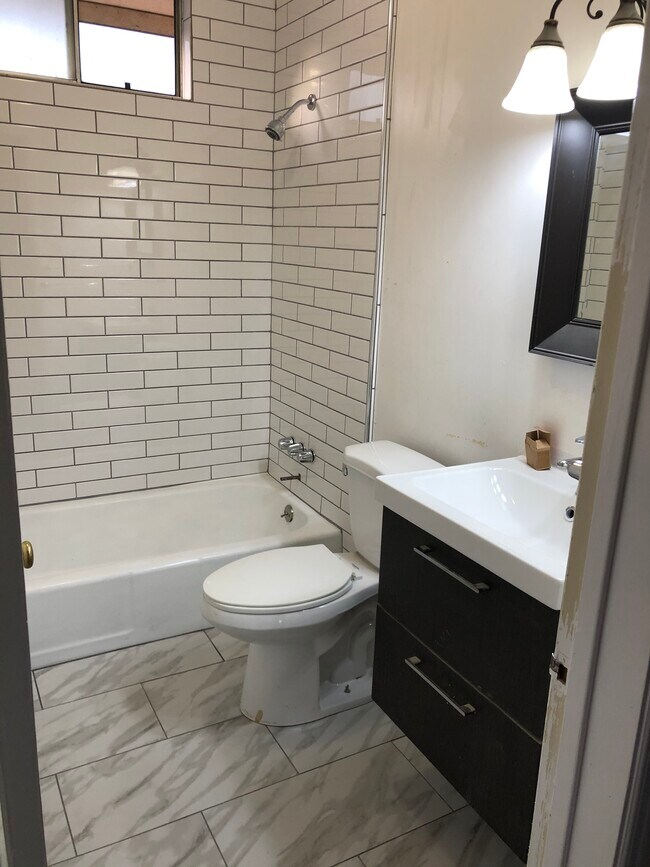 Bathroom, window above shower - 6117 S Fairfax Ave