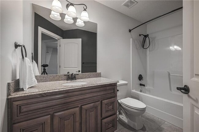 Building Photo - 5029 Woodstock Ct