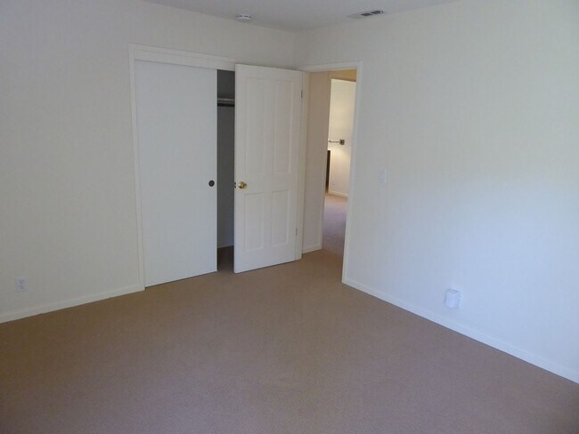 Building Photo - SPACIOUS FOUR BEDROOM / THREE AND HALF BAT...