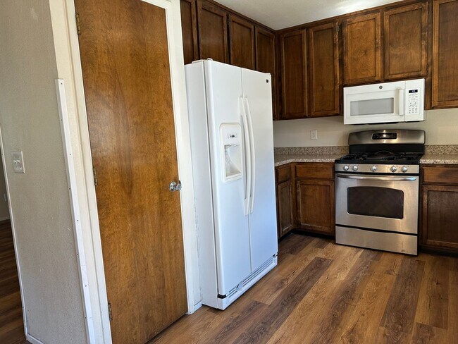 Building Photo - Charming Redding Home with Fireplace & Vau...
