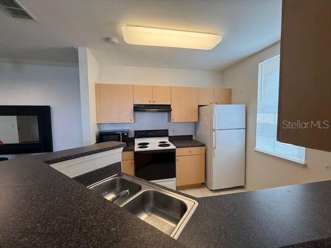 Building Photo - Siena one Bedroom condo with a Den