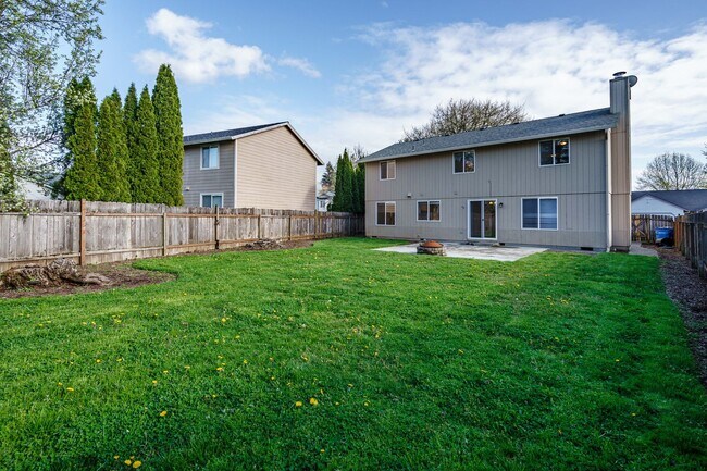 Building Photo - Recently Updated with Wood Laminate Flooring and Fresh Paint