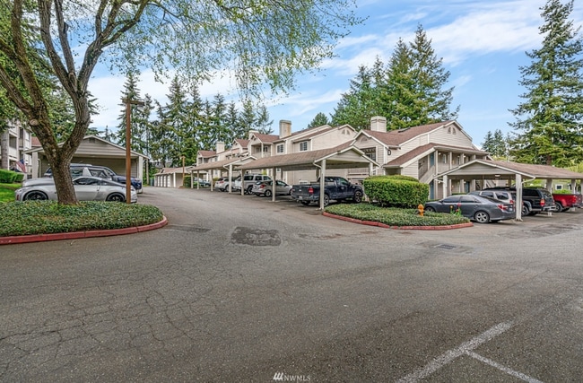 Building Photo - 2BR Condo w/ Vaulted Ceilings, W/D, Parking & Amenities