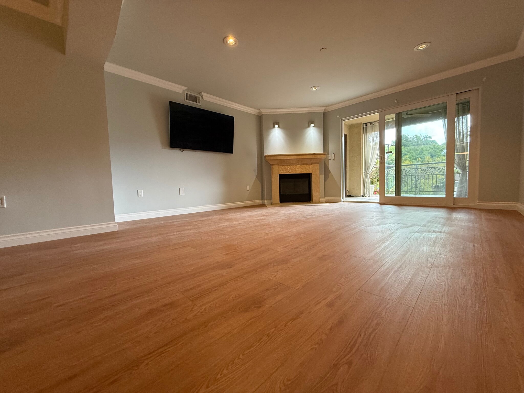 Livingroom with travertine fireplace - 6221 Monterey Rd