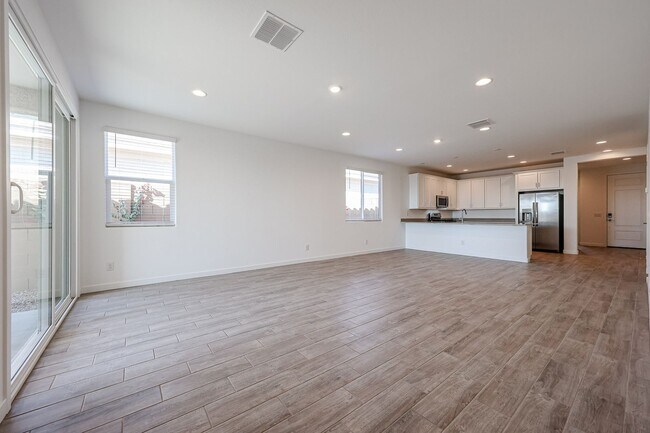 Building Photo - COMING SOON!! Recently built 5-Bedroom Home in Goodyear with Upgrades & Resort-Style Amenities