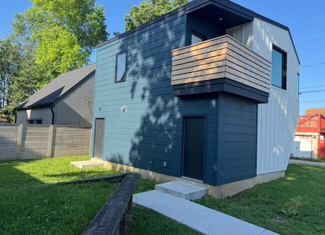 Building Photo - Vaulted Ceilings & Hardwood Floors in This Charming Indianapolis L